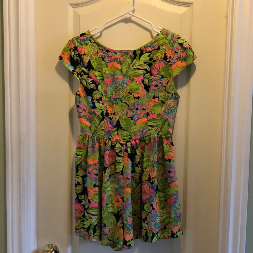 short lime green floral romper with zipper on back